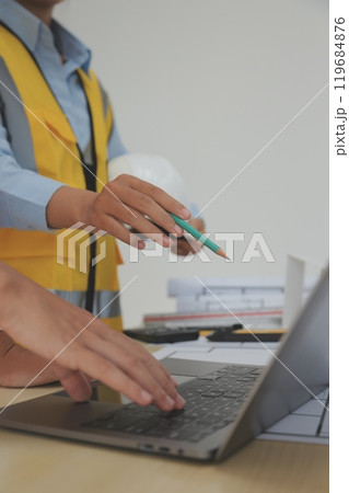 Construction and structure concept of Engineer or architect meeting for project working with partner and engineering tools on model building and blueprint in working site, contract for both companies. 119684876