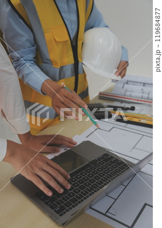 Construction and structure concept of Engineer or architect meeting for project working with partner and engineering tools on model building and blueprint in working site, contract for both companies. 119684877