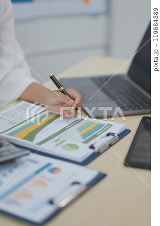 Business Documents, Auditor businesswoman checking searching document legal prepare paperwork or report for analysis TAX time,accountant Documents data contract partner deal in workplace office 119684889