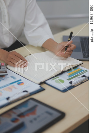 Business Documents, Auditor businesswoman checking searching document legal prepare paperwork or report for analysis TAX time,accountant Documents data contract partner deal in workplace office 119684896