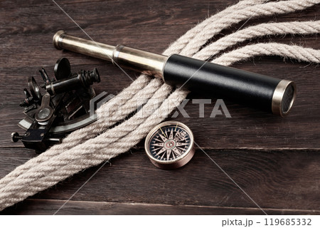 vintage spyglass telescope with sextant and compass 119685332