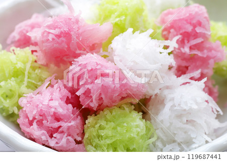 Sweet coconut balls, crispy coconut candies (Maprao Gaew). Thai traditional dessert Sweet coconut balls, crispy coconut candies (Maprao Gaew). Thai traditional dessert 119687441