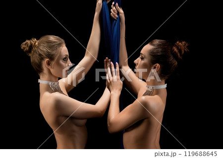 Pretty girls topless with blue cloth profile shot 119688645