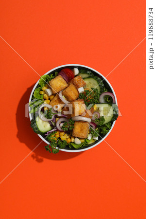 Fried tofu salad in a bowl, top view Fried tofu salad in a bowl, top view 119688734