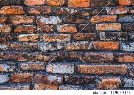 Texture of ancient old antique orange brick wall close up Texture of ancient old antique orange brick wall close up 119689378