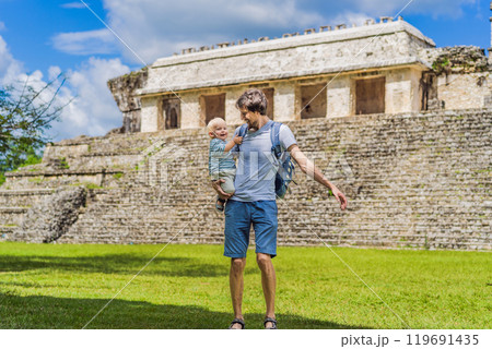Father with his toddler son exploring the ancient pyramids of Palenque, Mexico, surrounded by dense jungle. Cultural heritage and adventure travel concept Father with his toddler son exploring the ancient pyramids of Palenque, Mexico, surrounded by dense jungle. Cultural heritage and adventure travel concept 119691435