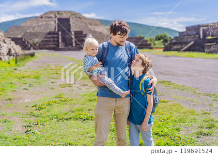 Father with his toddler and teenage sons exploring Teotihuacan, Mexico. Cultural heritage, ancient ruins, and archaeological adventure concept Father with his toddler and teenage sons exploring Teotihuacan, Mexico. Cultural heritage, ancient ruins, and archaeological adventure concept 119691524