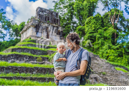 Father with his toddler son exploring the ancient pyramids of Palenque, Mexico, surrounded by dense jungle. Cultural heritage and adventure travel concept Father with his toddler son exploring the ancient pyramids of Palenque, Mexico, surrounded by dense jungle. Cultural heritage and adventure travel concept 119691600