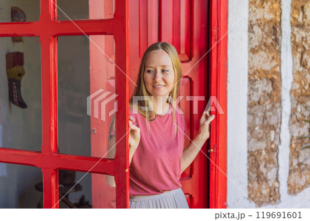 Female tourist in a colonial house in San Cristobal de las Casas, Mexico. Cultural exploration, architecture, and travel experience concept 119691601