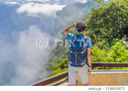 Male tourist exploring Sumidero Canyon National Park, Mexico. Adventure, natural exploration, and travel experience concept 119691672