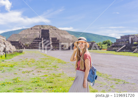 Female tourist exploring Teotihuacan, Mexico. Cultural heritage, ancient ruins, and archaeological adventure concept Female tourist exploring Teotihuacan, Mexico. Cultural heritage, ancient ruins, and archaeological adventure concept 119691720