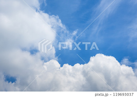 Blue sky fluffy white clouds on summer season bright clear skyline with beautiful cloudscape. Panorama blue sky clouds pattern on daylight with copy space. Cumulus cloudscape air climate sunny day 119693037