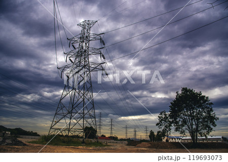 High voltage pole electric wiring distribution landscape energy engineering. Electricity energetic background with blue sky green mountain in countryside. Electric power energy engineering industrial 119693073