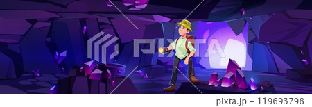 Man exploring cave filled with purple crystals. 119693798