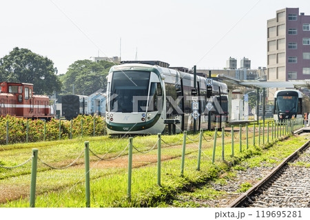 The circular light rail train drives past Hamasen Railway Cultural Park in Kaohsiung, Taiwan. 119695281