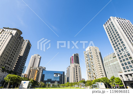 View of the park and surrounding modern buildings in front of Taichung City Council, Taiwan. View of the park and surrounding modern buildings in front of Taichung City Council, Taiwan. 119696881