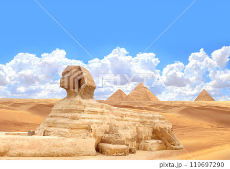 Famous Great Sphinx and pyramids of Chephren, Cheops, Menkaure, Cairo, Egypt. Great Pyramids and statue of Sphinx, mythical creature with head of man and body of lion, Giza complex (Giza Necropolis) 119697290