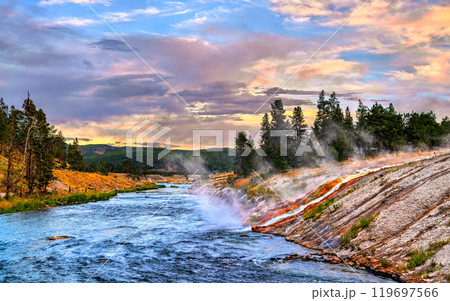 Heavy runoff from Excelsior Geyser to Firehole River at Yellowstone National Park, Wyoming, United States Heavy runoff from Excelsior Geyser to Firehole River at Yellowstone National Park, Wyoming, United States 119697566