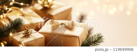 Gold-wrapped Christmas gifts with sparkling ribbons under soft lights. Festive holiday gift-giving atmosphere for Christmas or New Year. 119699906