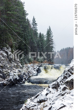 Kivach Falls, vertical landscape photography taken on a winter day Kivach Falls, vertical landscape photography taken on a winter day 119700870