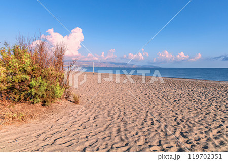 Sea shore. Beautiful empty beach in summer sunny day on Crete island in Greece. Sea shore. Beautiful empty beach in summer sunny day on Crete island in Greece. 119702351