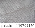 Recycled perforated white paper close up texture 119703470