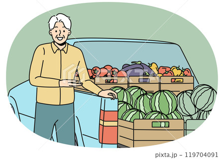 Elderly man farmer stands near car with fresh fruits and vegetables, selling healthy food at fair 119704091