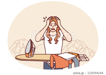 Housewife woman ironing clothes and clutching head in panic due to overload and fatigue 119704244