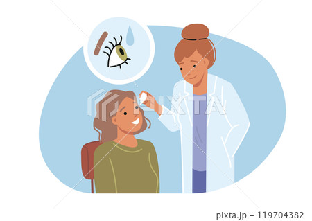 Doctor uses eye drops to treat dry pupils to help little girl treat DES that is causing discomfort 119704382