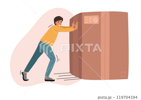 Man pushes heavy box and smiles while moving to new apartment or delivering order 119704384