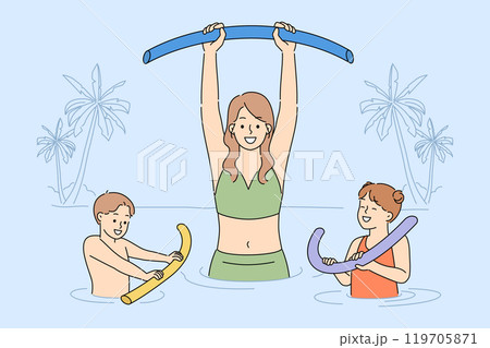 Water aerobics for family of mother and joyful children relaxing in pool on seashore 119705871