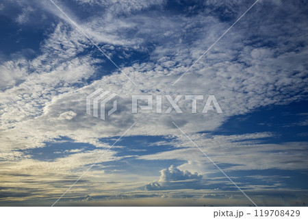 Tropical summer blue sky fluffy white cloud summertime on light sunny day cloudscape. Clear bright blue skyline spring sunlight climate background. Heaven blue environment ecology high scenic nature. 119708429