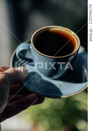 Close-up of hot coffee cup. Hot Coffee Drink Concept Close-up of hot coffee cup. Hot Coffee Drink Concept 119709179