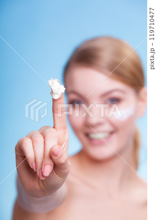 Skin care. Girl applying moisturizing cream. Skin care. Girl applying moisturizing cream. 119710477