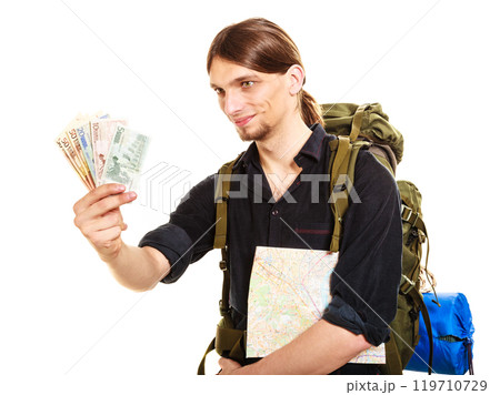 Man tourist backpacker holding euro money. Travel. Man tourist backpacker holding euro money. Travel. 119710729
