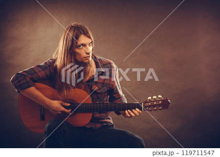Guitarist is playing the guitar. Guitarist is playing the guitar. 119711547