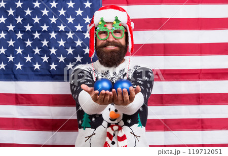 American tradition. Santa Claus on american flag. Celebrate xmas and new year in patriotic way. Tradition of patriotism. Traditional dignity. Christmas tradition from USA. My country my tradition American tradition. Santa Claus on american flag. Celebrate xmas and new year in patriotic way. Tradition of patriotism. Traditional dignity. Christmas tradition from USA. My country my tradition 119712051
