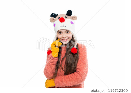 Girl kid wear warm hat isolated on white. Happy childhood. Teen girl in earflap hat. Winter fashion style. Girl in knitwear. Portrait of teen child wearing warm winter clothes. Warm mittens Girl kid wear warm hat isolated on white. Happy childhood. Teen girl in earflap hat. Winter fashion style. Girl in knitwear. Portrait of teen child wearing warm winter clothes. Warm mittens 119712300