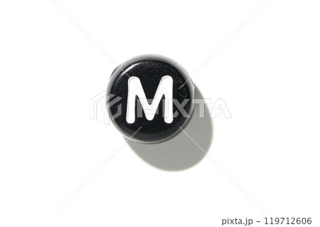 Black keyboard key with letter m isolated on white background with shadow Black keyboard key with letter m isolated on white background with shadow 119712606