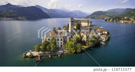 Most beautiful italian villages - unique romantic island San Giulio in Orta lake ( Lago di Orta) in Piedmont Province of Novara . aerial drone view Most beautiful italian villages - unique romantic island San Giulio in Orta lake ( Lago di Orta) in Piedmont Province of Novara . aerial drone view 119713377