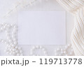 Blank Card with White Pearls and Cozy Knit Fabric for Minimalistic Winter Holiday or Event Design 119713778