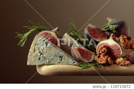 Blue cheese with figs, walnuts, and rosemary. Blue cheese with figs, walnuts, and rosemary. 119713872