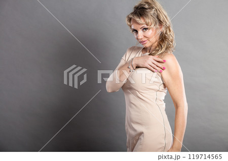 Glamour lady with beige dress. Glamour lady with beige dress. 119714565