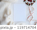 Blank Card with Cozy Knit Fabric and Festive Ribbon for Christmas or Holiday Greeting Template. Christmas mockup 119714704