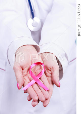 Female hands with pink ribbon 119714723