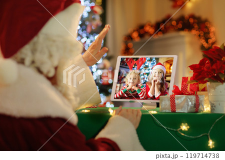 Video call on Christmas day. 119714738
