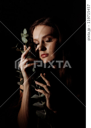 Portrait of beautiful caucasian woman model with closed eyes.  119715457