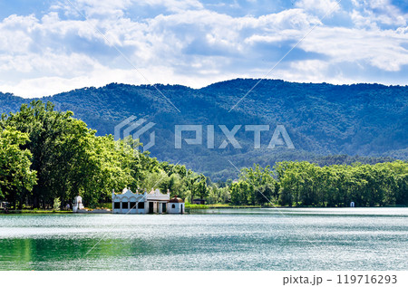 Beautiful views of Lake Banyoles (Banyoles) with the old white summer houses. Girona, Catalonia Beautiful views of Lake Banyoles (Banyoles) with the old white summer houses. Girona, Catalonia 119716293