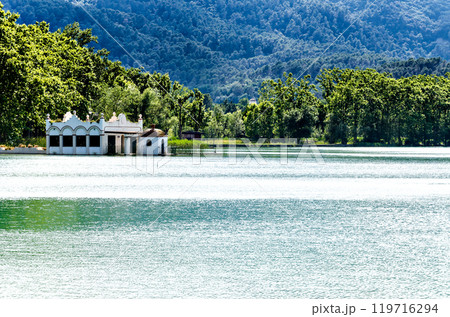 Beautiful views of Lake Banyoles (Banyoles) with the old white summer houses. Girona, Catalonia Beautiful views of Lake Banyoles (Banyoles) with the old white summer houses. Girona, Catalonia 119716294