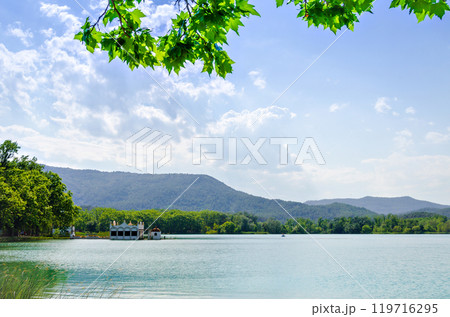 Beautiful views of Lake Banyoles (Banyoles) with the old white summer houses. Girona, Catalonia Beautiful views of Lake Banyoles (Banyoles) with the old white summer houses. Girona, Catalonia 119716295